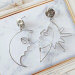 太陽と月 横顔ワイヤーピアス