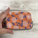 オレンジのお花の小銭入れ