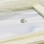 シルバーのスマイルトラカフ