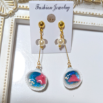 貝殻の中の小さな海 めんだこ ピアス/イヤリング