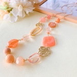 オレンジ色のロングネックレス✧*