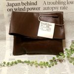大きいクリップで留める革の袋バッグ