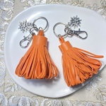 【Autumn  Market】🧡❄️上質レザータッセル×スノーキーチャーム