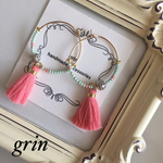 《再販》ピンクのタッセルピアス