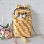 （受注制作）手編みニットのかわいいトラネコちゃんの　がま口のスマホポシェット（茶トラ）