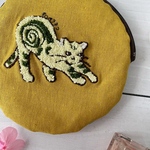 プロペラネコのまぁるいポーチ