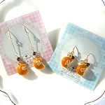 小さな齧られあんぱんのピアス（イヤリング）