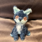 包む四つ足の深海幻獣さん