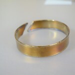 「妖精の腕輪」金色の純チタンバングル試作