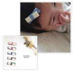 優しいアンティークカラーの ベビーヘアクリップ