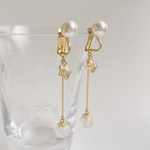 パール クリスタル スター 星 のゆらゆら揺れる 春 イヤリング　母の日　ギフト