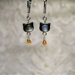 黒ネコちゃんとオレンジサファイヤのニットマーカー（宝飾品として作られた宝石たちシリーズ）