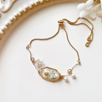 パールとドライフラワー𑁍𓏸𓈒ブレスレット     レジン     レジンブレスレット