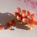 桜のヘアクリップ　キラキラオレンジ色