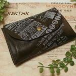 スタンプいっぱい使い古したの？レザーアコーディオンポーチ