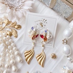 Vintage brass charm