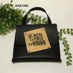 小さい革鞄～バッグの持ち手にぶら下げて