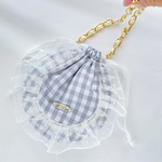 ドットチュールフリルがポイントのふんわり丸い巾着ポーチ(グレー)