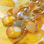 mimosa quartz ﾐﾓｻﾞｸｫｰﾂ
✴︎ アルコールインク × 天然石 イエロークォーツ × 翡翠 色ビーズ の 一も点物 ゆらゆら アシンメトリー ピアス / イヤリング 