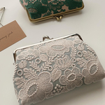通帳入れや化粧ポーチにも✨がま口  smile flower × タンバリンにて