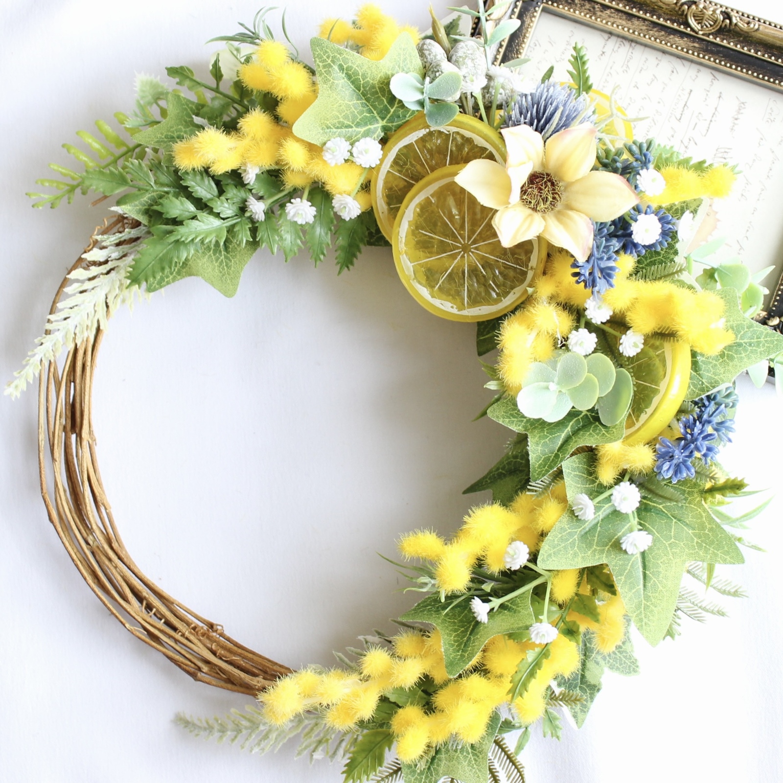 ミモザとレモンのクレセントリース春リースハーフリースアーティフィシャル
