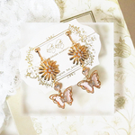 【春のおでかけに】ちょうちょとお花のイヤリング・ピアス（クリアピンク）