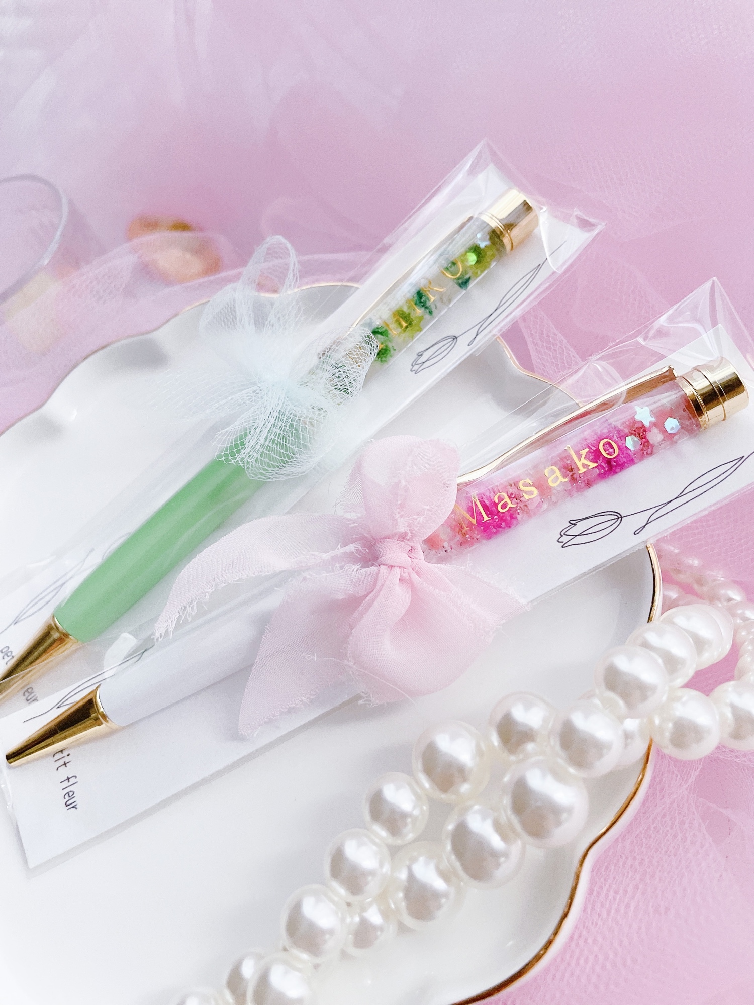 期間限定販売♡】リボンと桜のチャーム付き♡文字入れ可♡ 桜色のお花