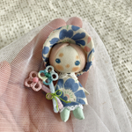 帽子をかぶったお人形さん