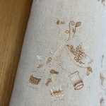 刺繍布＜イト・トリドリ＞綿麻キャンバス　生成り×オレンジグラデーション糸