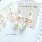  クリスタル が キラリ ✧︎ かすみ草 と パール の 耳飾り ( ブルー )・ レジン ・ ピアス / イヤリング 