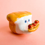 たこ焼きにシンパシーを感じている食パンのリングスタンド