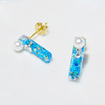 海色の宝石ピアス