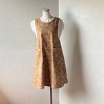 茶系　葉っぱ柄　横ボタンのふんわりすっきりフレアーエプロンドレス　100