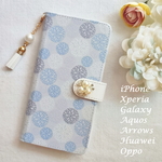 再販♡【AQUOS Sense SH-01K/SHV40/SH-M05】手帳型カバー🌼淡いブルーとパープルお花🌼きらきらビジュー🌼アクオス🌼スマホカバー🌼タッセルストラップ