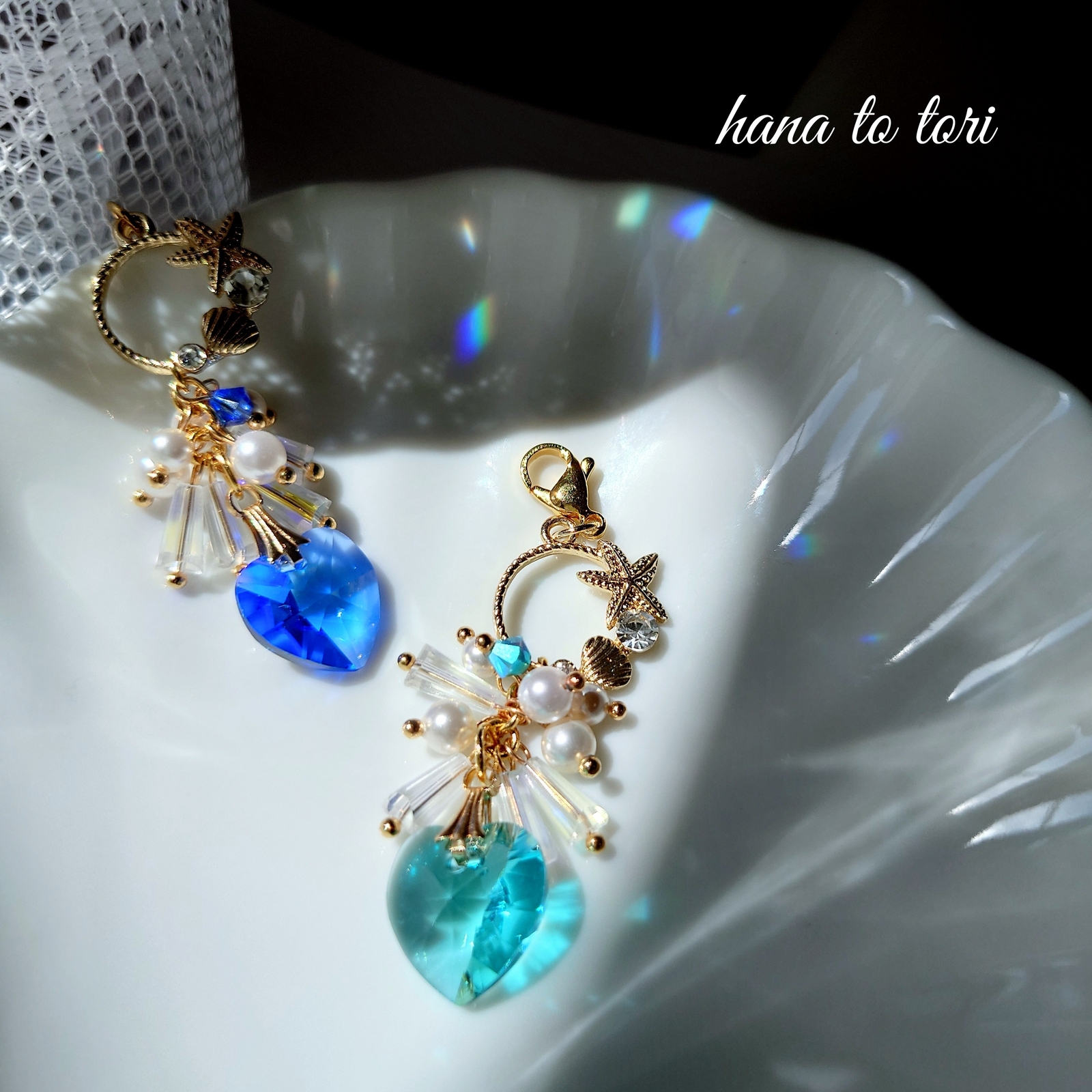 SWAROVSKI 携帯ストラップ おしゃれ 幸せクローバー 四つ葉