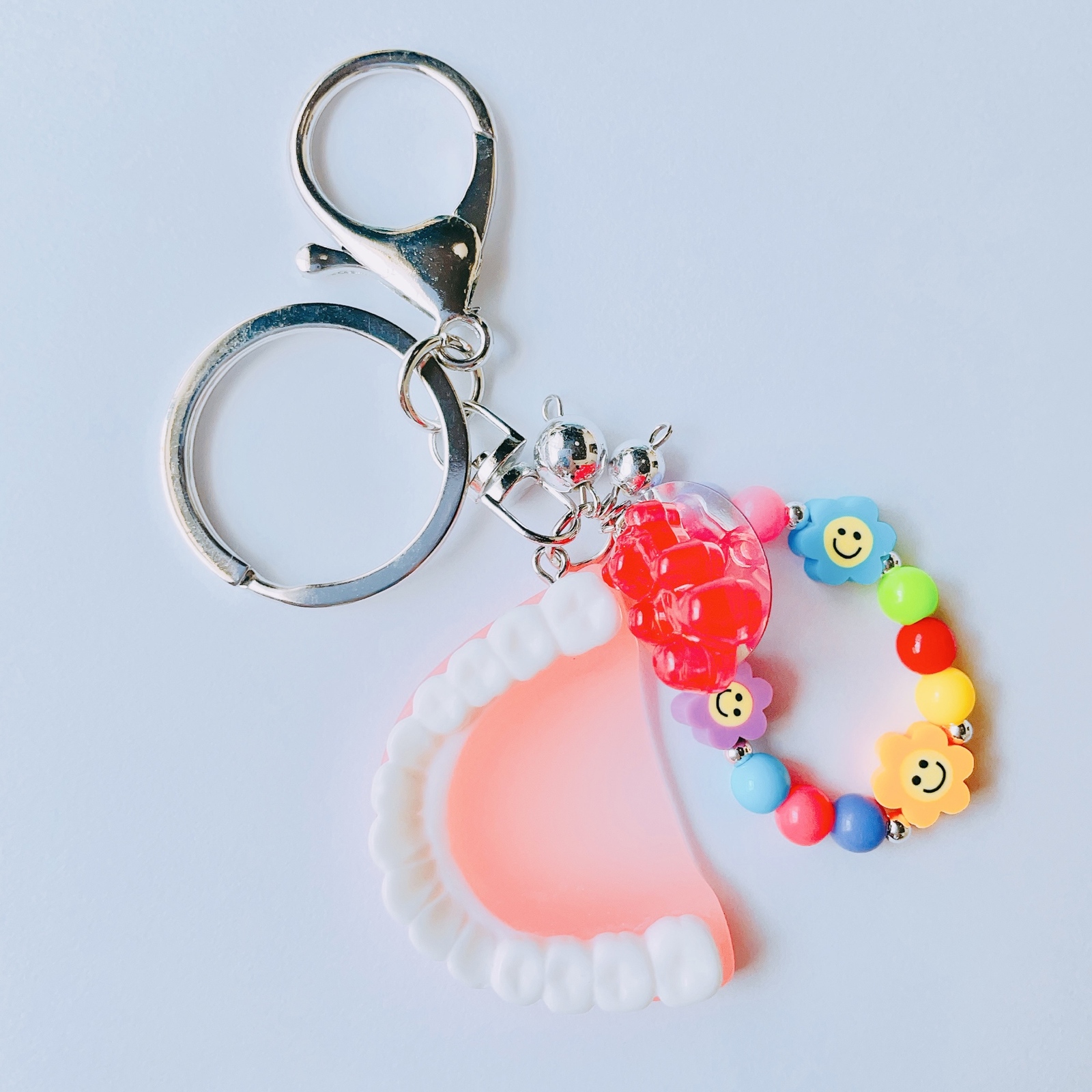 キーホルダー 入れ歯 歯 派手 ビーズ カラフル カラー スマイリー ニコ