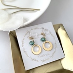 緑の雫と月のチャームのイヤリング