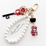  🧸🌹🗝  rosy bear 〜 魔法の鍵 ✵ ハートビジューの鍵と薔薇のクマさんの キーホルダー  チャーム ドライフラワー