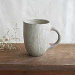 不思議な色のたっぷりマグ