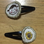手刺繍子どもヘアピン 素朴の世界〜ひまわりみたいな女の子〜