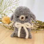 グレーのもふもふわんこ🩶ポンポンのぬいぐるみ