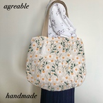 デイジー刺繍バッグ(ベージュ)  コロンとしたトートバッグ　タッセル付き