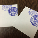 white cards with blue lace