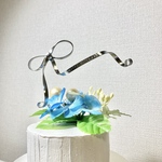 ケーキトッパー リボン型happy birthday ୨୧