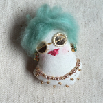 dool brooch