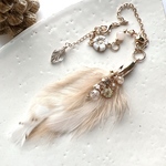 🌟new🪶白い羽根チャーム　ゴールド