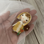 お花を持ったお人形さん
