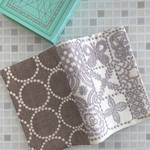 ブックカバー    forest tile  & tambourine ミナペルホネン の 刺繍生地　文庫本カバー　エクリュ&ブラウン