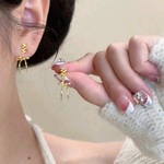 大人のクロスリボンピアス ゴールドリボンピアス デート 結婚式 卒業式 卒園式 入園式  入学式