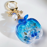 シンプルなクリスマスりんごシェイカー　ブルー　シャカシャカキーホルダー